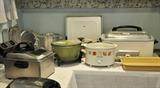 More appliances including a Waring Pro deep fryer, retro Sunbeam deep cooker and a Westinghouse roaster oven