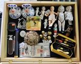 A group of bisque dolls join a wigless MA Tiny Betty along with a Royal Doulton Dickensware piece and small size tools.
