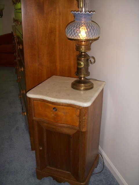 Unusual half-commode with marble top.  Lamp has opalescent art glass shade