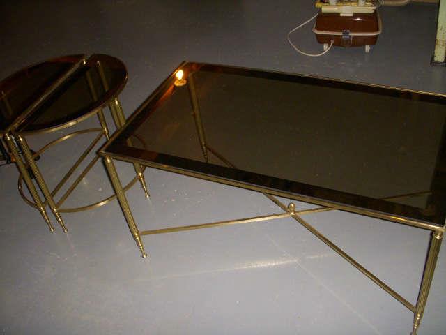 Coffee table & demilune tables are brass with smoked glass tops