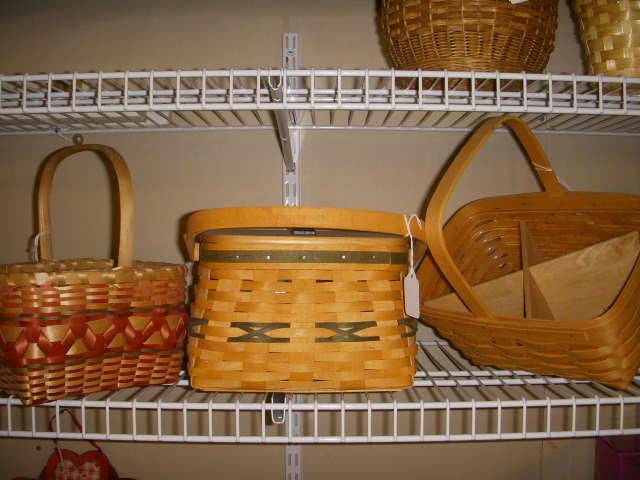 Two on right are Longaberger.  One on left appears to be a newer Native American basket