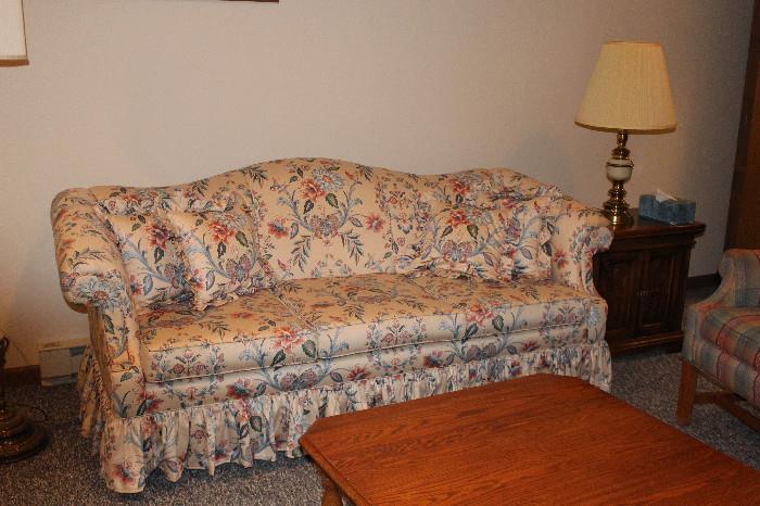 This is a sofa in the rec room in the basement - it's like in mint condition and has a very solid (and expensive) feel to it.  The table is equally awesome.