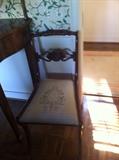 One of four antique chairs