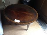 Flame mahogany oval coffee table