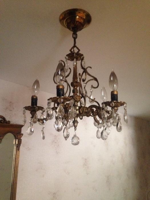 Small matching vintage chandelier.