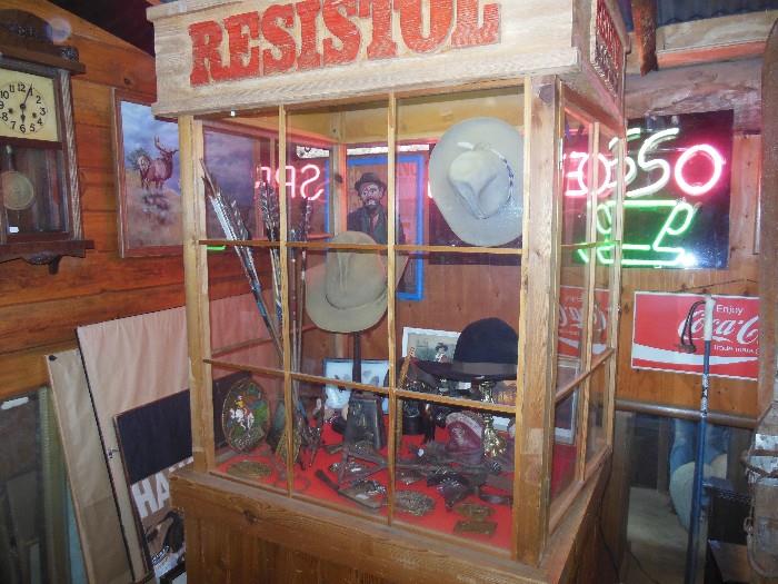 Resistol Display case for sale, Stetson hats, belt buckles, Indian made arrow head arrows, Knives, etc.
