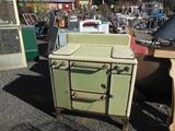 Was in kitchen used until brought here. 40's gas stove great condition, wood handles.