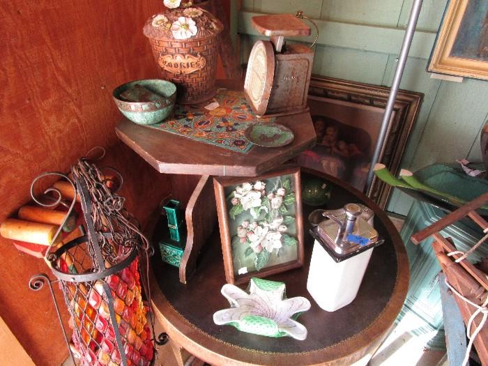 Old hanging lamps, murano glass, pictures, cookie jars, several old scales and California pottery table and 50's table with leather top.