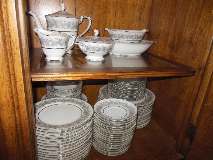 Many pieces and extras grey and white china set.