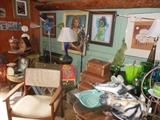 Art and 50's danish chair and Murano glassware and suitcases.