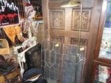 Old skeleton for medical training old leaded glass and carved door
