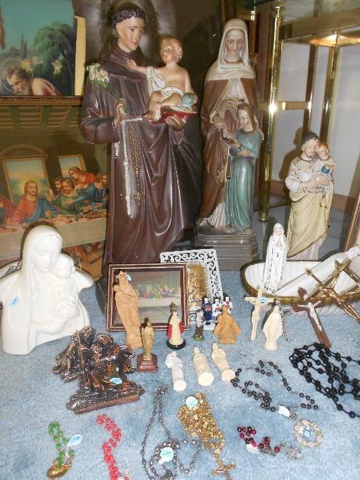 Vintage chalkware statuary.    Many small religious items and pictures.