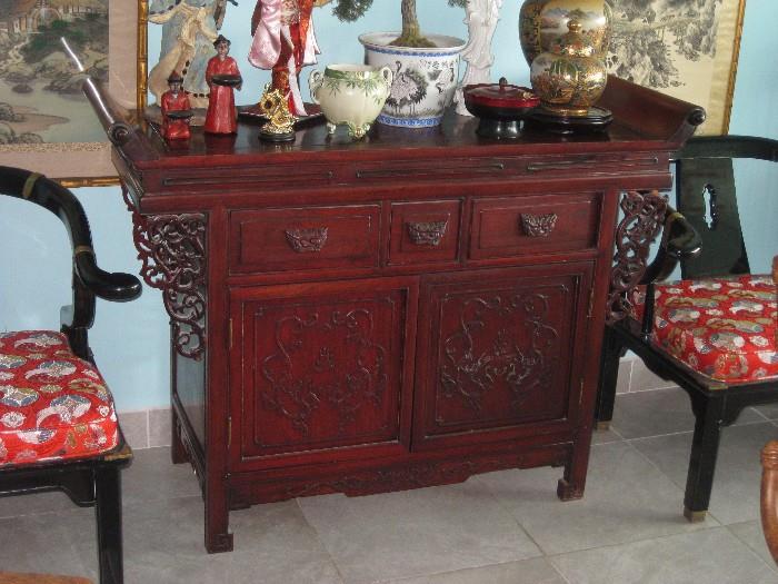 Ornate Asian console cabinet