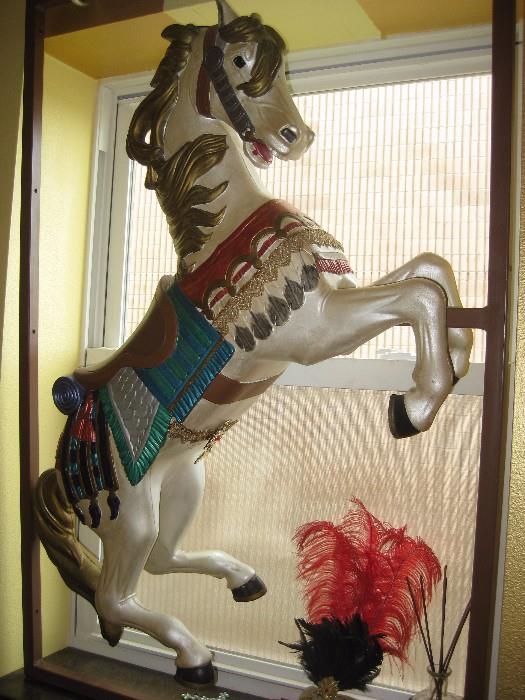 large carousel horse on a metal frame