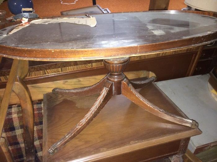 Pedestal antique coffee table.