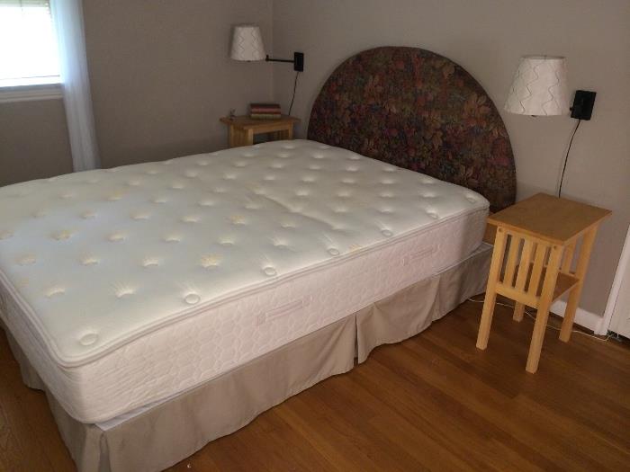 Headboard is not attached. Mattresses sold with frame.