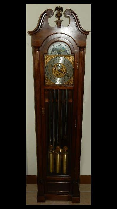 Grandfather clock by Daneker. 72" tall walnut. Rebuilt 4 years ago and serviced regularly