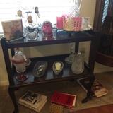 Pretty colored glass and tea cart.