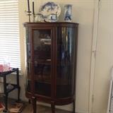Antique curved glass china cabinet!  More blue and white.