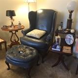 Leather chair and ottoman.  Lyre table.