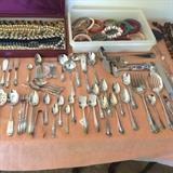 Silver flat ware and jewelry.