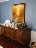 Gothic style sideboard with china and silverplate tea service