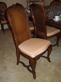 one of a set of 8 Drexel Grand Villa chairs, covered in very pale coral fabric