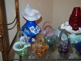some of the many pieces of Fenton Glassware, most of which were very limited or special edition pieces.