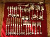 large set of Oneida stainless flatware in Michelangelo pattern