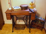 old Singer sewing machine, old nursing school yearbooks, oil lamp