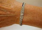 Exceptional Platinum and Diamond Art Deco bracelet with sapphires, appraised in 1996 for $16,000. I have it priced to sell!!!!!!!! Great investment piece!!!