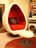 original vintage egg chair with matching ottoman.  White vinyl with red interior, with built in speakers