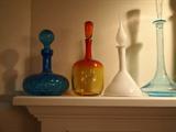 decanters on the mantle, Italian Empoli and Blenko