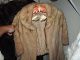 one of many furs, both vintage and newer, real and faux