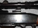 detail of Remington Wingmaster Model 742 308 WIN with Redfield 2x-7x Scope