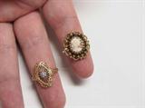 gold rings, one with small diamond, the other with a cameo