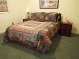 like new contemporary bed with matching night stands and tv cabinet, bedding is very nice as well!