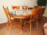 LARGE, like new oak double pedestal dining table with 6 nice pressed back chairs!