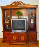 like new ASHLEY inlaid entertainment center, still has original tags attached!
