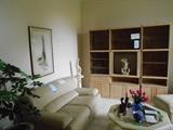 Natuzzi Italian Leather Furniture, 3 tower lighted storage unit, pottery statue