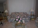 4 pc pastel floral living room suite, glass and brass tables, table lamps