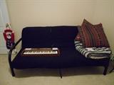 Casio Tone Electronic Keyboard, futon, floor pillows