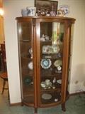 antique curved glass cabinet    $375