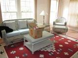 WICKER SUN ROOM FURNITURE AND WOOL RUG