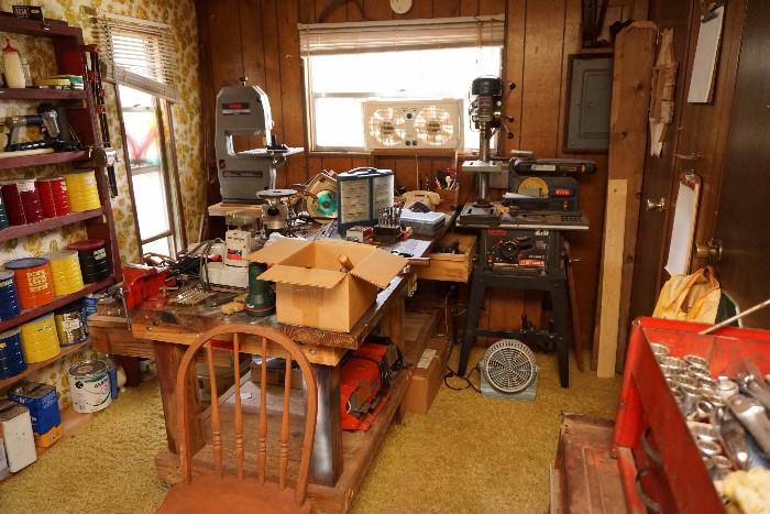 Inside his small workshop