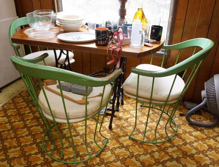 Three of the 4 vintage wire chairs. The top rail under the paint is bent plywood. There were no visible markings