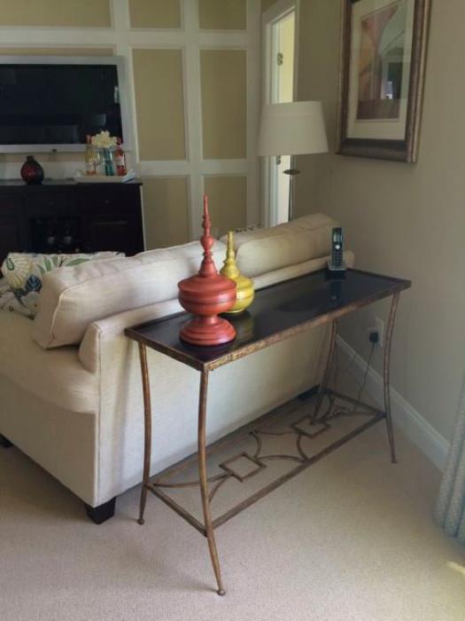 Black marble top gold trim console table