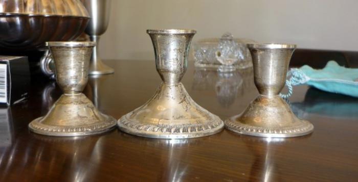 Sterling silver candle stick holders, 2 small 1 Large     http://bid.auctionbymayo.com/view-auctions/catalog/id/7753/lot/987156/?url=%2Fview-auctions%2Fcatalog%2Fid%2F7753%2F