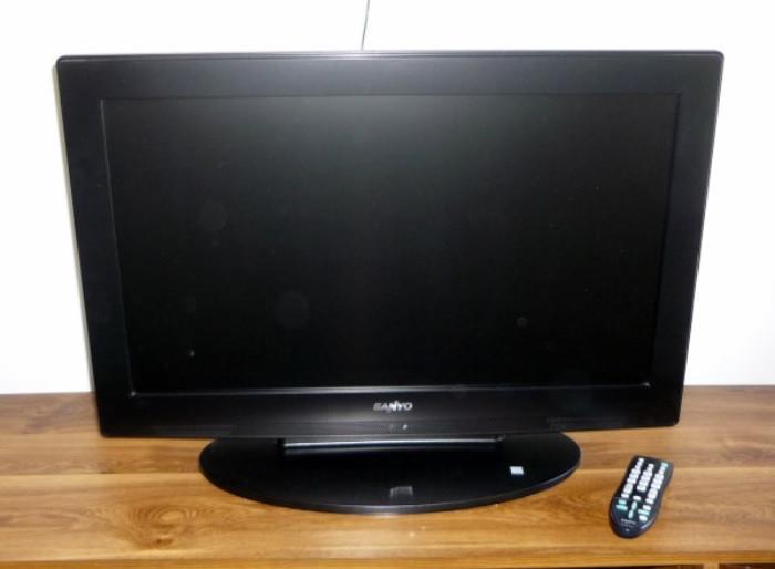 Sanyo Flat Screen Television with Wall Mount, Remote and Stereo System on an Entertainment Center      http://bid.auctionbymayo.com/view-auctions/catalog/id/7753/lot/987196/?url=%2Fview-auctions%2Fcatalog%2Fid%2F7753%2F%3Fpage%3D1%26items%3D100