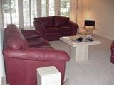 Italian leather sofa, loveseat, and chair with ottoman